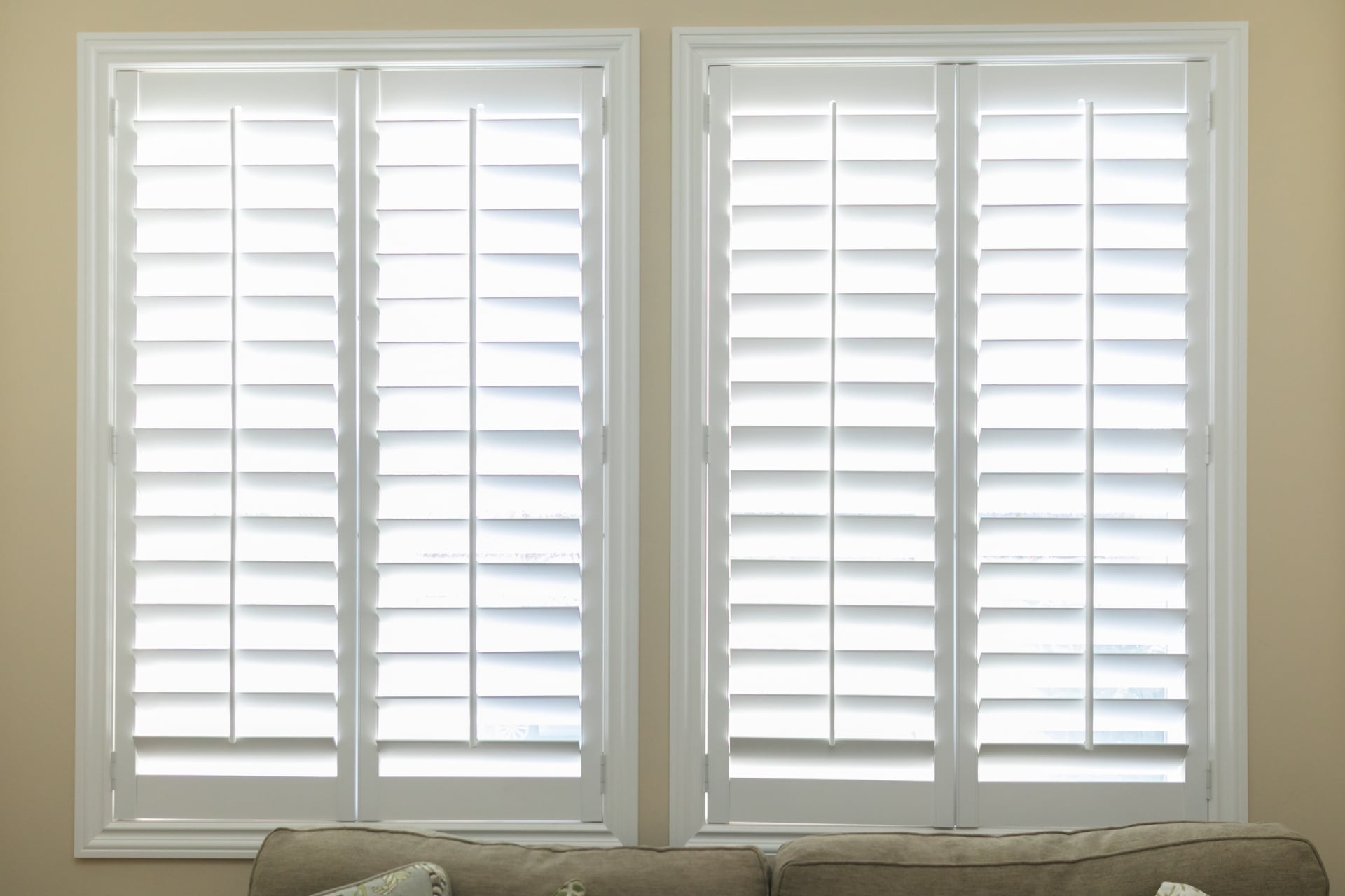 White shutters with off white walls